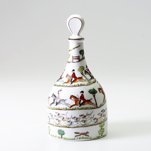 Appraisal: Staffordshire hunting pattern bottle with lid English th c marked