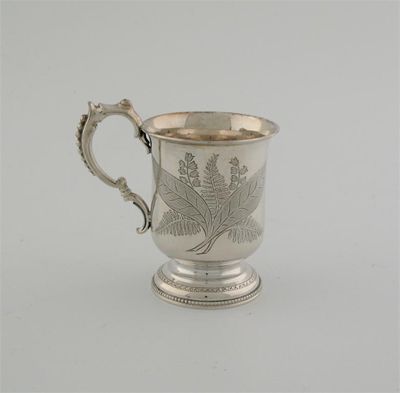 Appraisal: A Victorian christening mug with bead borders and engraved fern