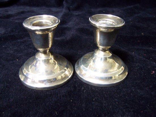 Appraisal: A pair of squat candlesticks Birmingham