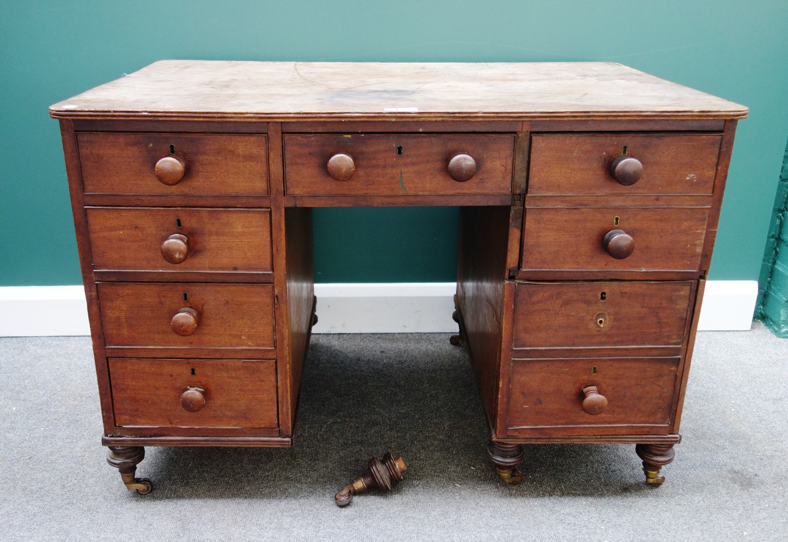 Appraisal: A th century mahogany writing desk with an arrangement of