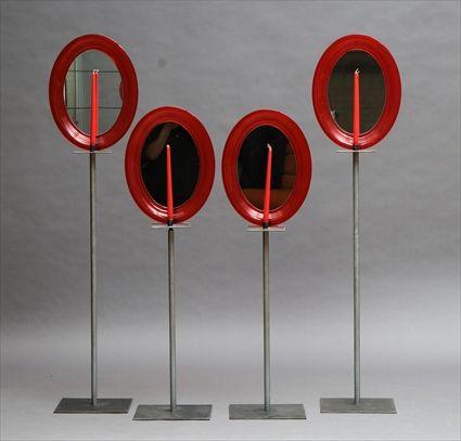 Appraisal: Set of Four Contemporary Metal and Red Plastic Candlestands with