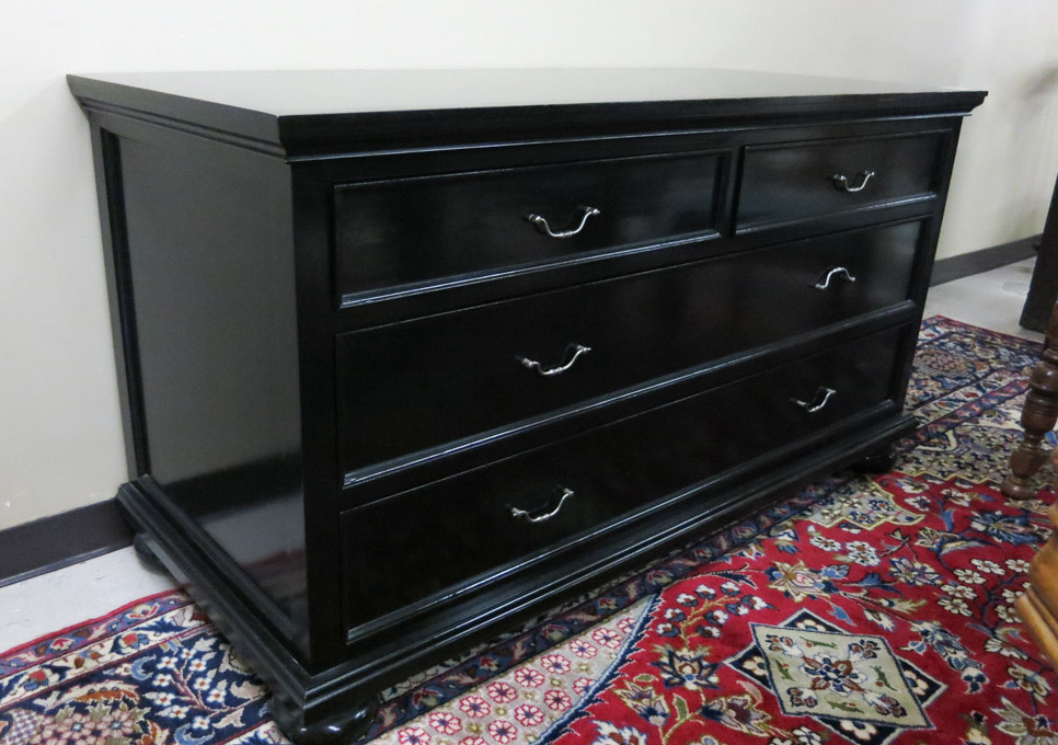 Appraisal: LARGE EBONIZED LOW CHEST OF DRAWERS unknown maker recent production