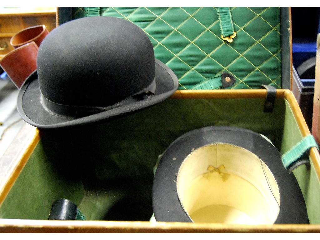 Appraisal: A Scott Co Piccadilly top hat in leather fitted suitcase