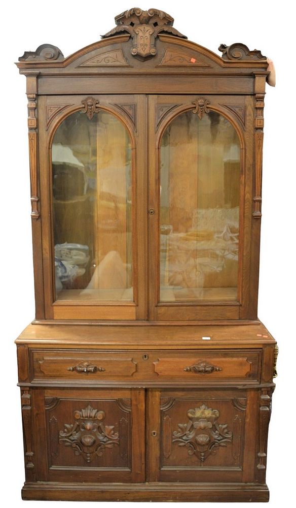 Appraisal: Victorian Walnut Cabinet having two glass doors over one drawer