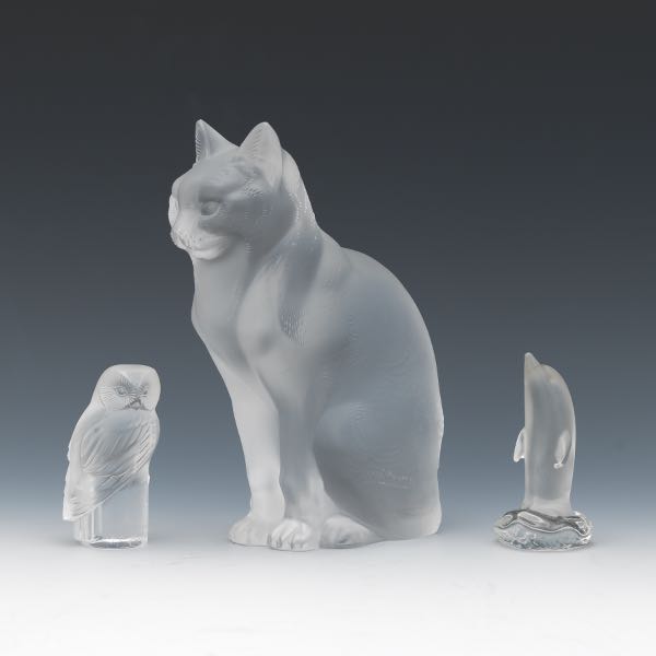 Appraisal: THREE LALIQUE CRYSTAL ANIMAL FIGURINES Including a crystal cat figurine