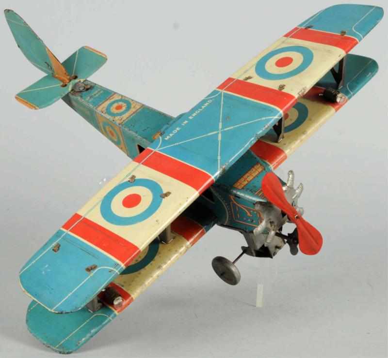 Appraisal: Early Tin Litho Bi-Wing Airplane Wind-Up Toy English Marked Sunray