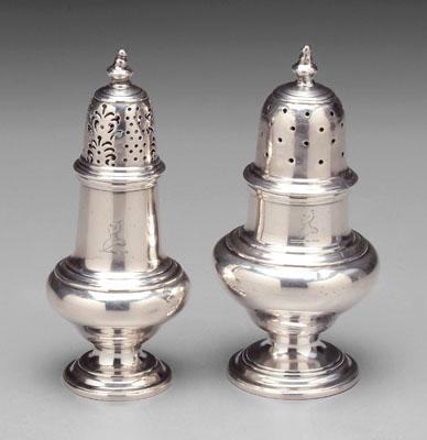 Appraisal: Two English silver casters urn bodies and finials stepped bases