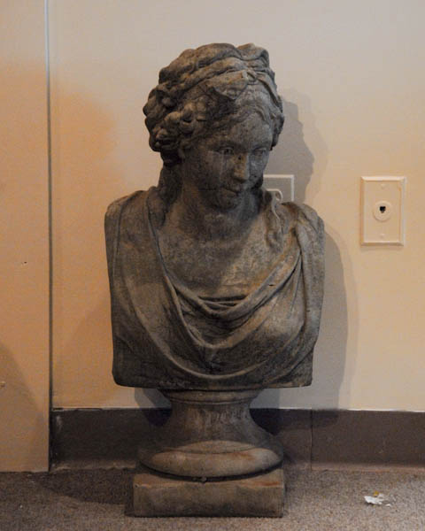 Appraisal: Artist Unknown Bust of Woman Cast cement on pedestal Some