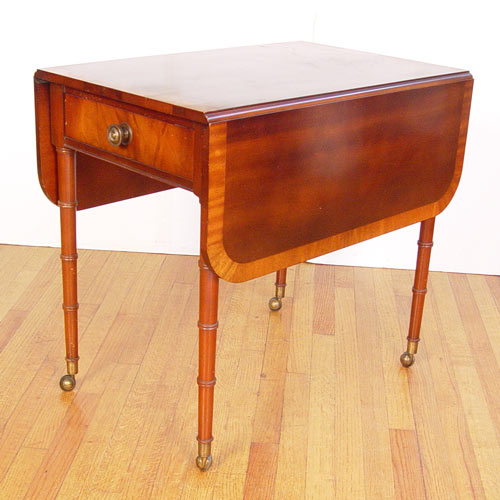 Appraisal: BANDED MAHOGANY PEMBROKE TABLE Single drawer drop leaf table with