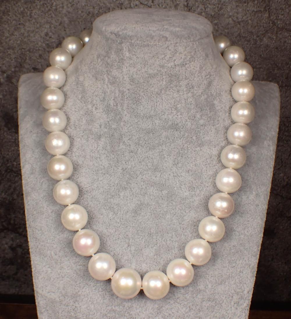 Appraisal: SOUTH SEA PEARL AND EIGHTEEN KARAT GOLD NECKLACE - hand-knotted