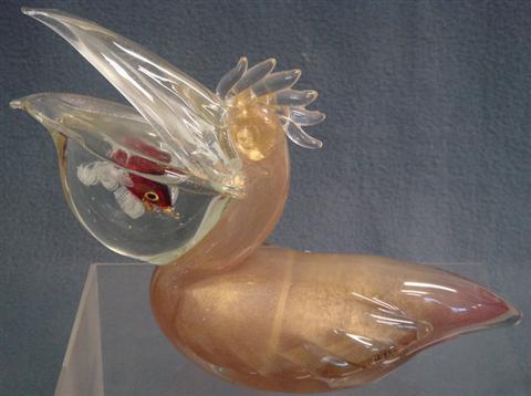 Appraisal: Venetian glass pelican with small fish in mouth interior of