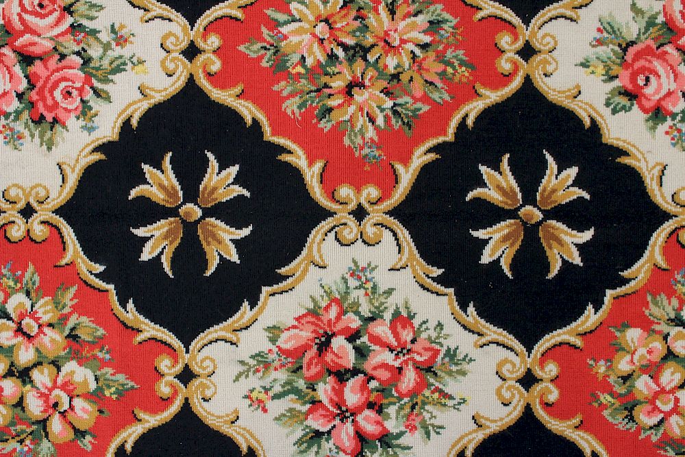 Appraisal: Stark Machine Made Needle Work Rug rows of large floral