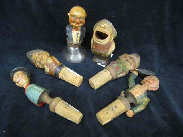 Appraisal: Figural Carved Wooden Items bottle stopper bell other