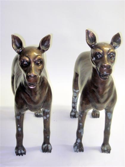 Appraisal: Pair of large Chinese bronze figures of standing dogsDark brown