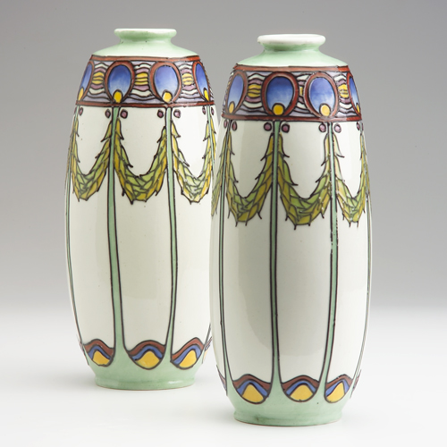 Appraisal: MINTON Pair of ovoid vases designed by Louis Mark Solon