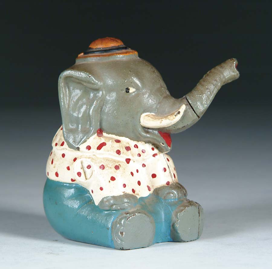 Appraisal: CAST IRON ELEPHANT STILL BANK Animated costumed elephant with hat