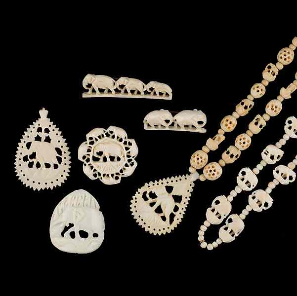 Appraisal: Large Grouping of Ivory Jewelry A grouping of carved Ivory