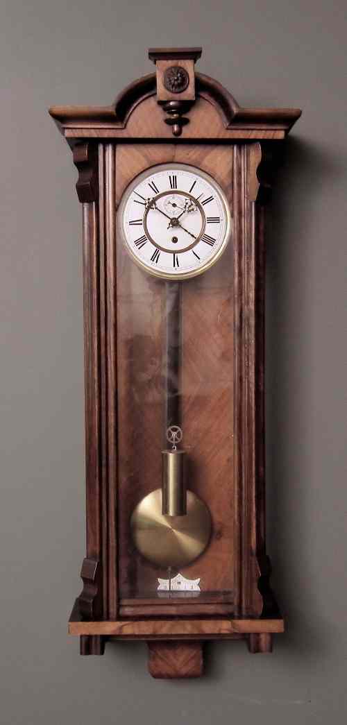 Appraisal: A th Century Continental walnut cased ''Vienna Regulator'' the ins