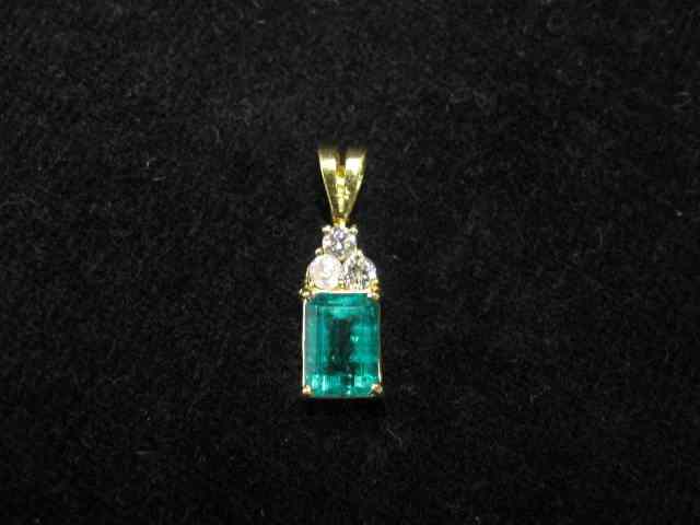 Appraisal: Emerald Diamond Pendant carat rectangular gem with three diamonds above