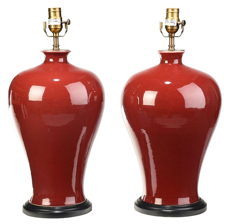 Appraisal: Pair of Oxblood Vases Converted to Lamps Chinese baluster form