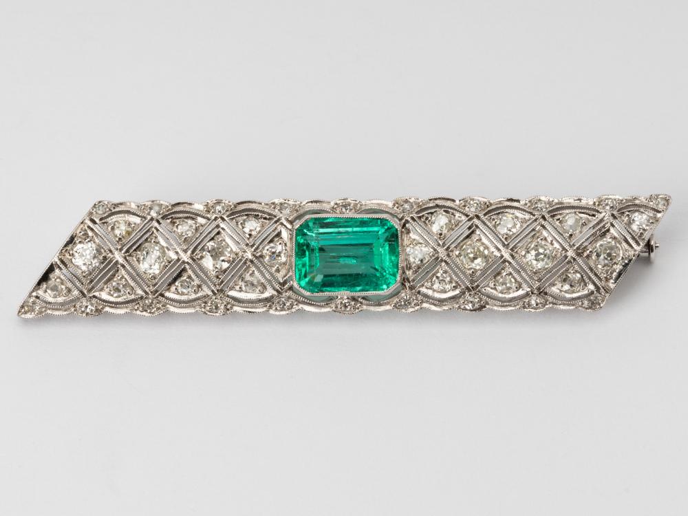 Appraisal: KARAT WHITE GOLD EMERALD DIAMOND BROOCHCenter bezel set with one