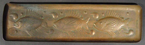 Appraisal: Rectangular Newlyn copper pen tray embossed with three stylised fish