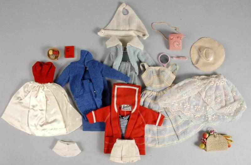 Appraisal: Six Early Barbie Fashions Description Complete fashions include Mood for