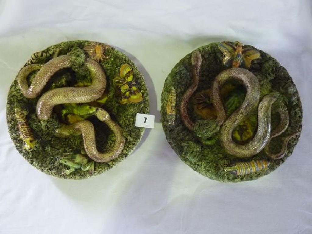 Appraisal: A pair of th century Palissy style snake plates impressed