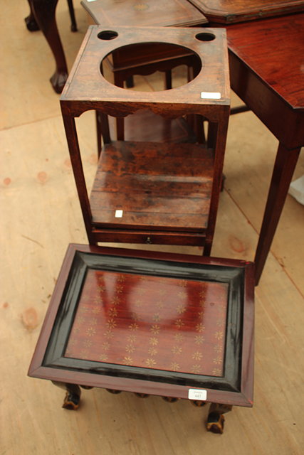 Appraisal: A TWO TIER BLACK LAQUERED TRAY TABLE together with a