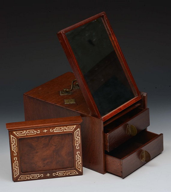 Appraisal: A CHINESE HARDWOOD VANITY BOX with inlaid sliding front opening