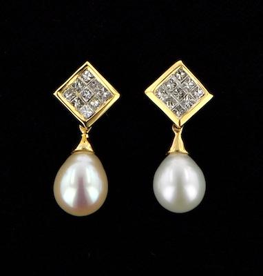 Appraisal: A Pair of Diamond and Pearl Earrings k yellow gold