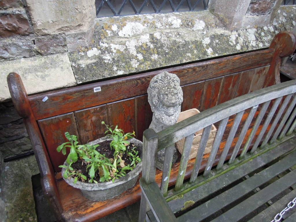 Appraisal: A Victorian pitch pine church pew with shaped ends and