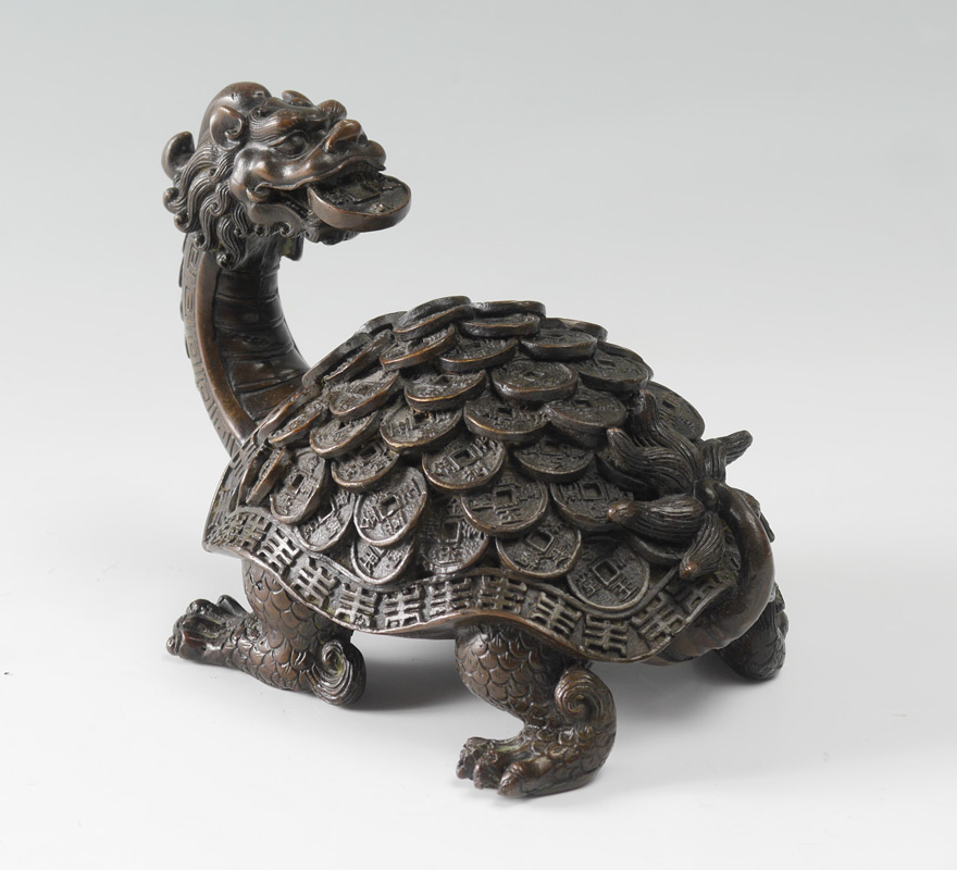 Appraisal: CHINESE BRONZE DRAGON TURTLE Mythological dragon turtle with coin shell