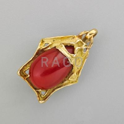 Appraisal: OXBLOOD CORAL K YELLOW GOLD PENDANT Textured pentagonal setting supports