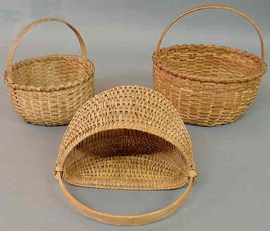 Appraisal: Three splintwood baskets th c largest approx h x dia