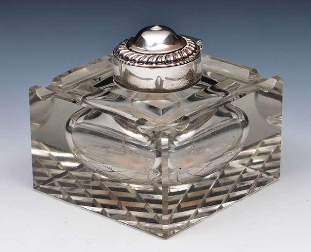 Appraisal: Cut glass inkwellof square form with silver mounted neck and