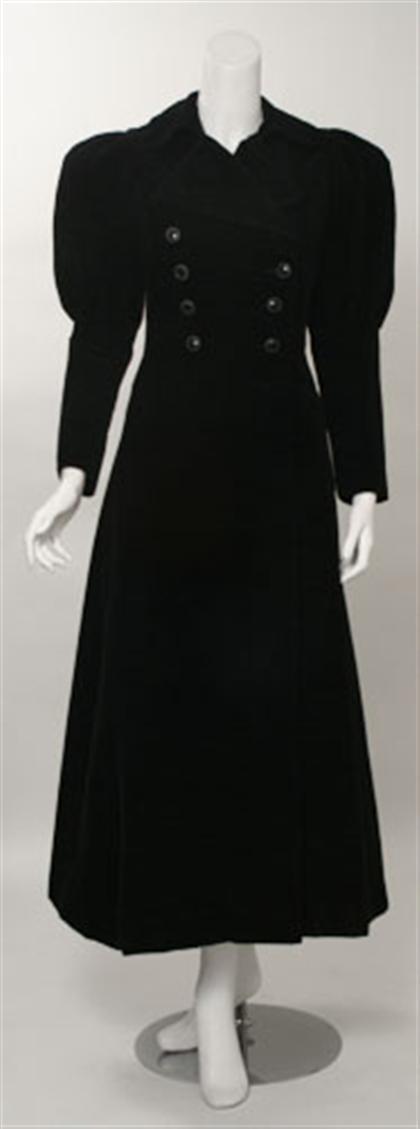 Appraisal: Yves Saint Laurent black velvet frock coat s Textured velvet