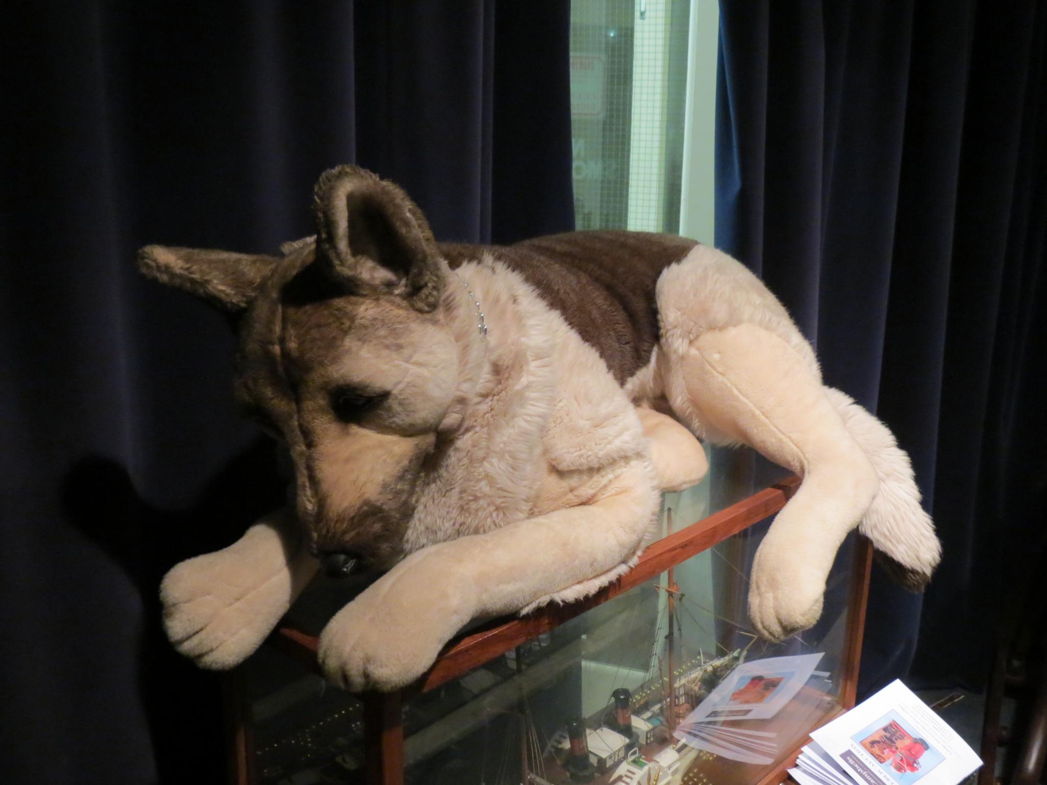 Appraisal: A life-size soft toy German Shepherd dog recumbent pose in