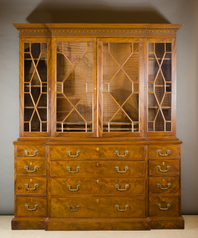 Appraisal: GEORGE III MAHOGANY BREAKFRONT SECRETARY BOOKCASE English early th century