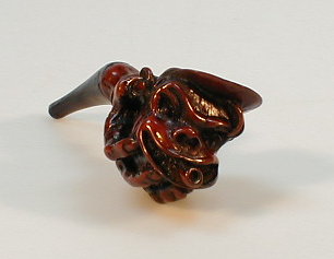 Appraisal: A carved reproduction pipe