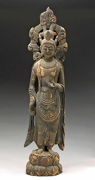 Appraisal: A carved wood figure of Kannon Carved from a single