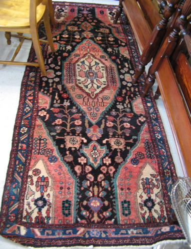 Appraisal: PERSIAN TRIBAL HAMADAN RUNNER floral and central floral medallion design