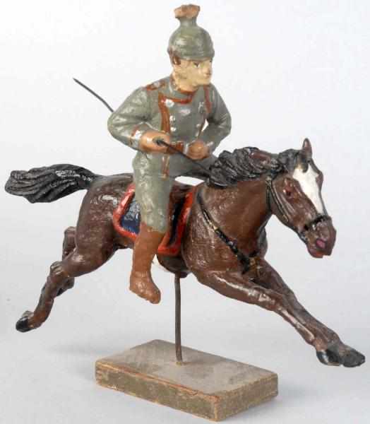 Appraisal: Elastolin Lancer on Springing Horse Composition horse and rider Slight