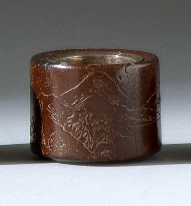 Appraisal: BAMBOO THUMB RING th CenturyWith incised figural landscape design noted