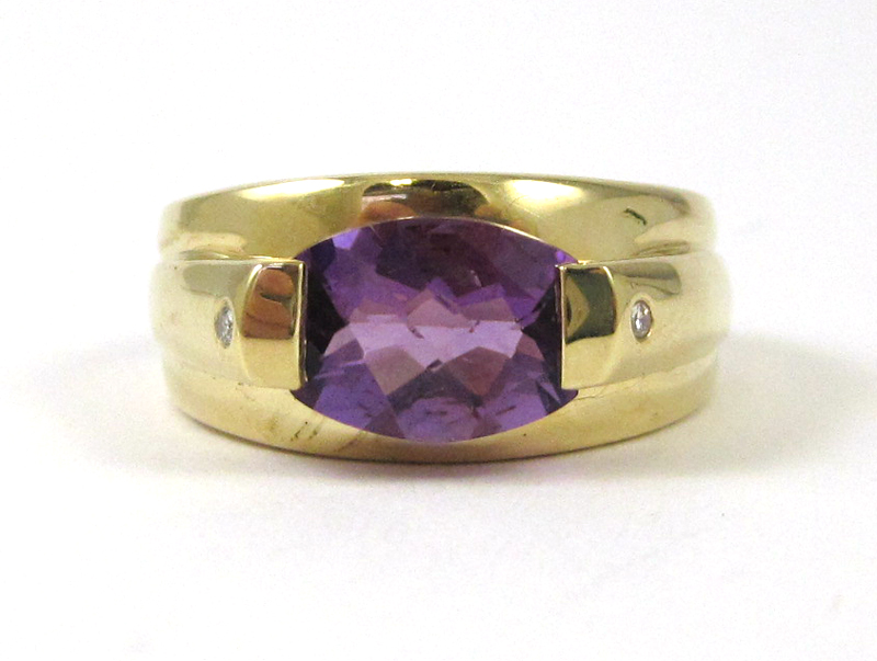 Appraisal: AMETHYST DIAMOND AND FOURTEEN KARAT GOLD RING set with two