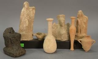 Appraisal: Seven Egyptian pieces to include a carved stone Pharaoh three