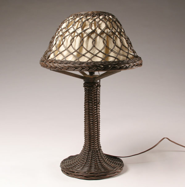 Appraisal: Heywood Wakefield woven rattan lamp Mission style cloth liner in