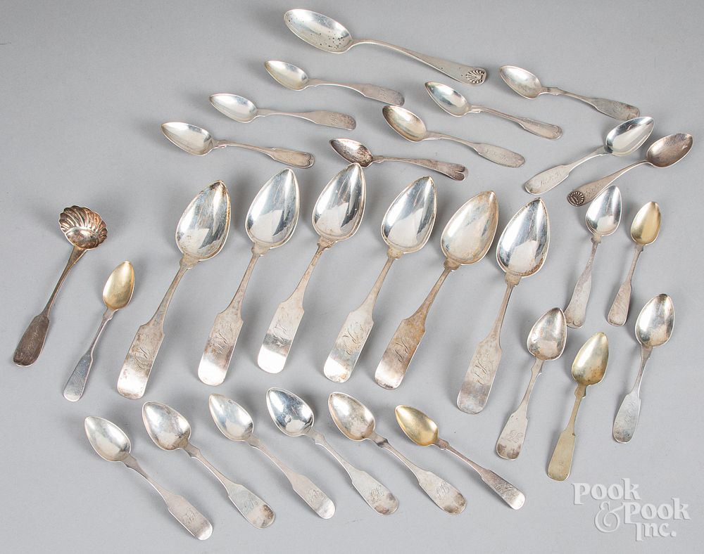 Appraisal: Coin and sterling silver spoons Coin and sterling silver spoons