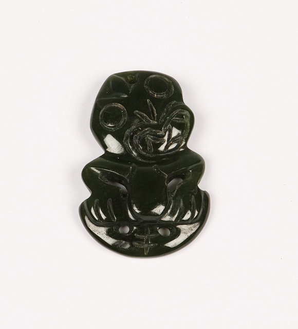 Appraisal: A MAORI NEPHRITE HEITIKI of figural form cm