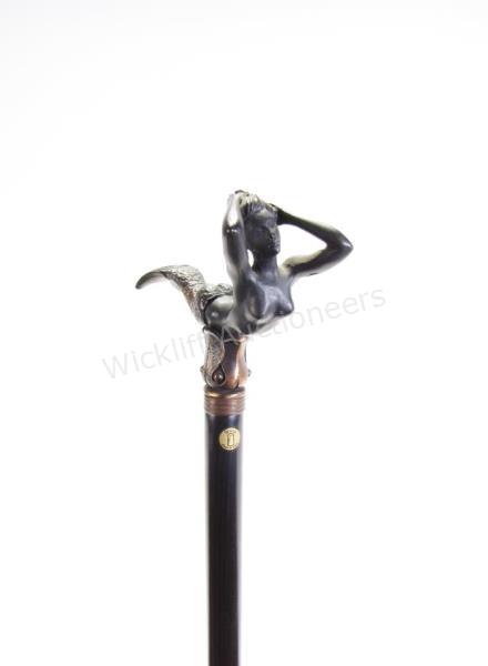 Appraisal: Spanish Mermaid Cain solid wood shaft mermaid figural handle makers